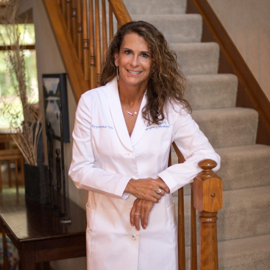 Dr. Paula Jones in a white coat.