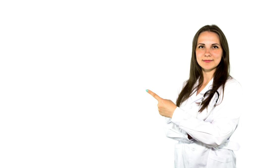 A female doctor with a stethoscope points to her left.