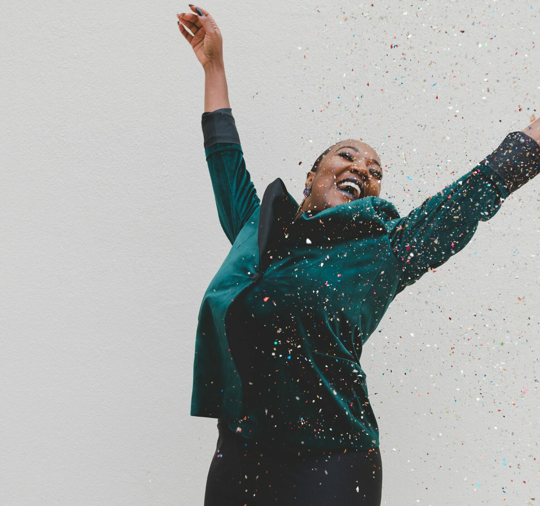 A happy woman jumping