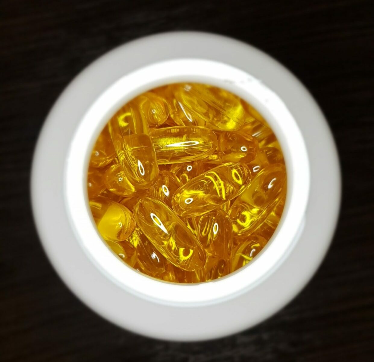 A bowl of vitamin D supplements.