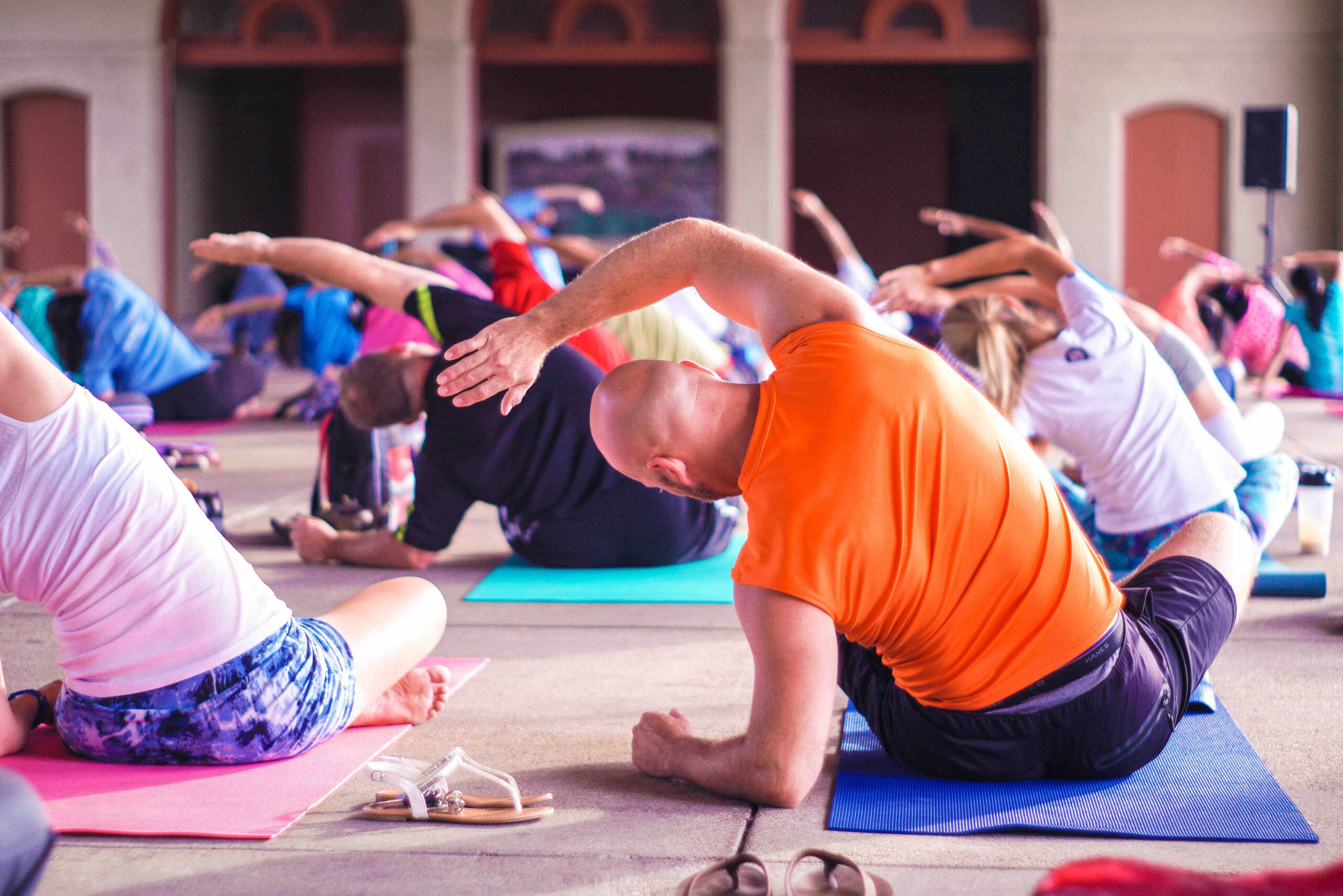 A class offering yoga for men and women.