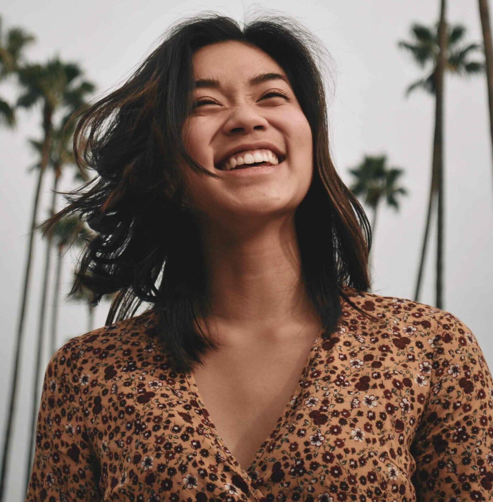 A happy, healthy woman smiling.