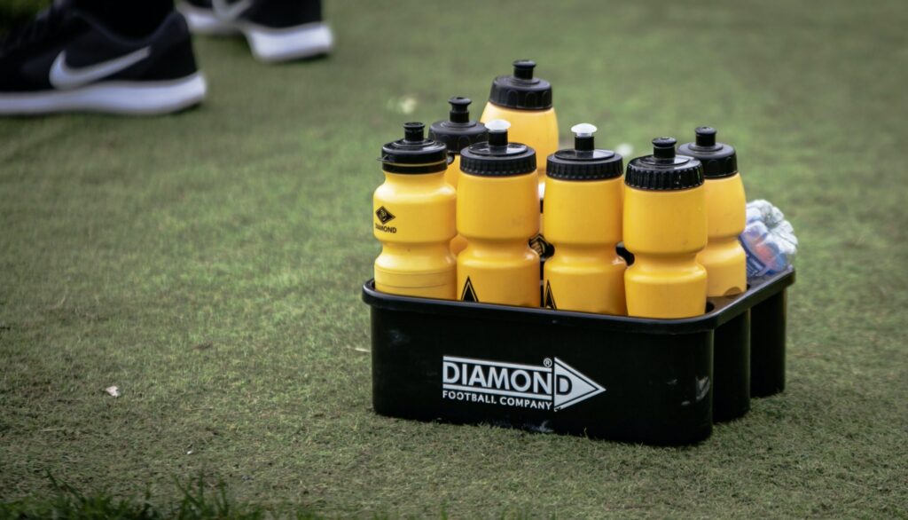 Sports drinks on a soccer field.