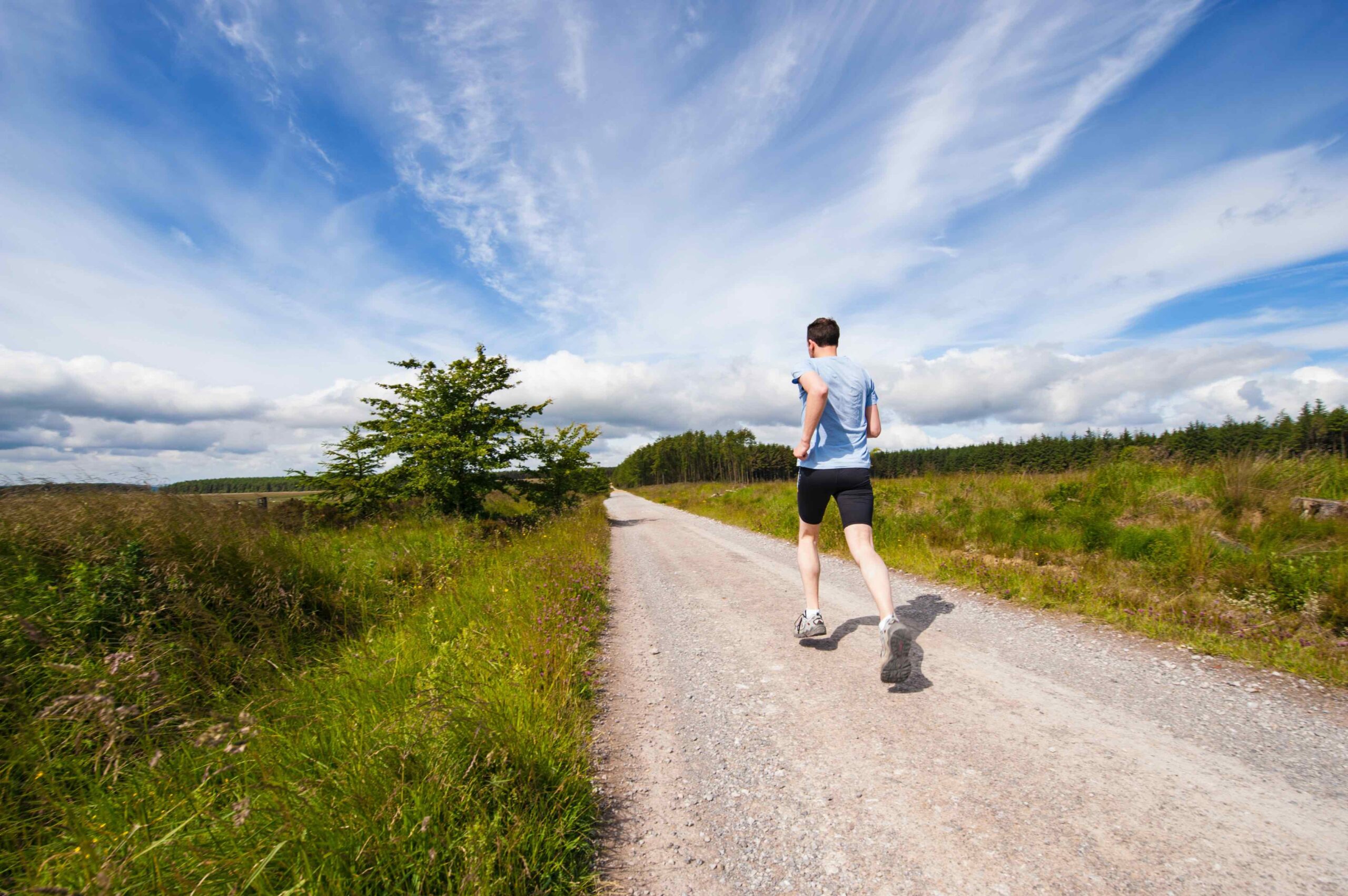 A man running on a road.